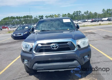 2015 Toyota Tacoma Base V6 z USA, uszkodzony, nr VIN 3TMLU4EN1FM177255